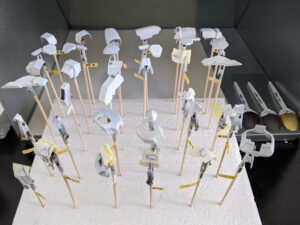 Sinanju Stein model kit pieces prior to gilding