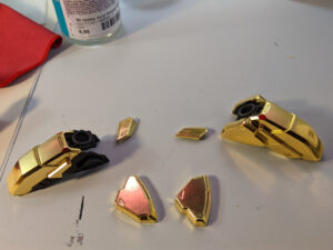 Sinanju Stein model kit pieces gold leaf gilded.